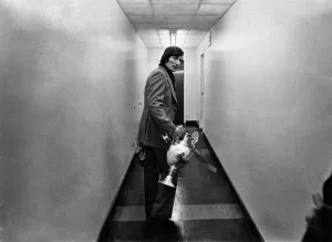 00251 Prints: Liverpool v. Leicester Still Clutching the Trophy leaving the dressing room is Captain