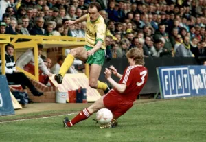 Liverpool v. Norwich City Steve Staunton tackling Michael Phelan