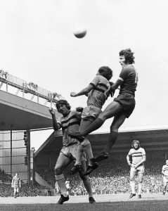 00244 Prints: Liverpool v West Ham Liverpools John Toshack climbs above the Hammers defence to head for
