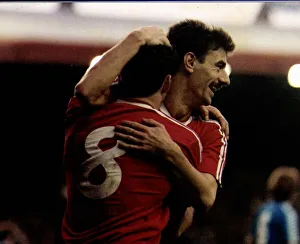 Liverpools Ian Rush and John Aldridge celebrate a goal during a Division One match