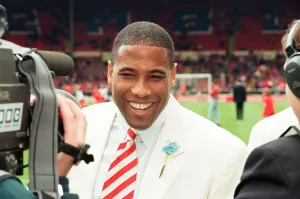 White Suit Prints: Liverpools John Barnes on the pitch at Wembley being interviewd by the BBC before