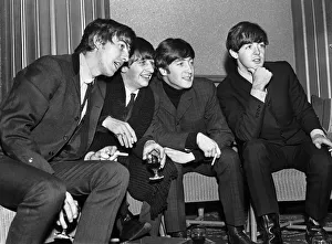 Cigarette Prints: Liverpudlian pop group The Beatles relaxing backstage at The Regal Cinema in Cambridge