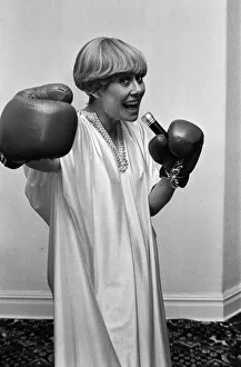 Liz Dawn aka Vera Duckworth of Coronation Street fame wearing boxing gloves. 7th May 1982