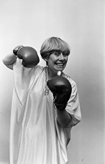 01074 Prints: Liz Dawn aka Vera Duckworth of Coronation Street fame wearing boxing gloves. 7th May 1982