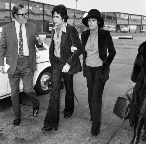 00942 Prints: Liza Minnelli and Desi Arnaz Jnr stepped arm-in-arm from a jumbo jet at Heathrow Airport