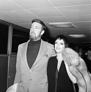 01140 Prints: Liza Minnelli and her new husband Jack Haley Jr arrive at Heathrow to finish off their