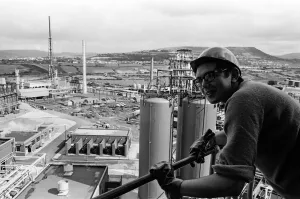 Llandarcy oil refinery. Trainee engineer John Bolt, 21, gets a birds eye view of the oil
