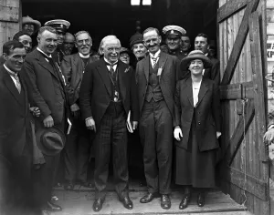 Former Prints: Lloyd George laughing heartily over a joke with the Chaired Bard (next him on right), Mr