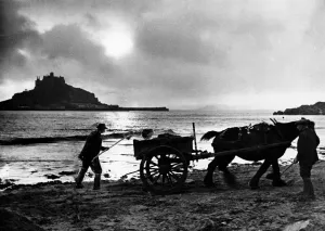 00086 Prints: The last load before the light fails - evening beside St Michaels Mount in Cornwall