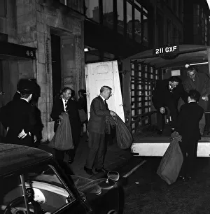 00027 Prints: Loading sacks of mail from the post office into a van, ready for delivery