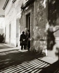 Shadows Prints: Two local men talking on the street in Italy - shadows casts circa 1950