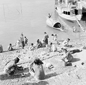 Sanitation Prints: Locals bath in the Buriganga River Dacca, Bangladesh. February 1961 l