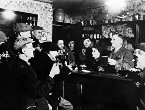 D Day Prints: Locals at Kings Arms Beesands have a final drink before the pub closes for the duration