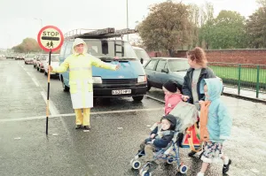 01483 Prints: Lollipop lady Janet Taylor on duty at the junction of Trunk Road with Kings Road
