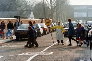Middlesbrough Prints: Lollipop lady Susan Hall escorts children across Crescent Road, Worcester Street Crossing