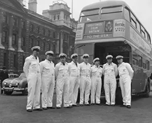 00002 Prints: London Bus Tour USA Group of milkmen stand in front of a London Double Decker bus