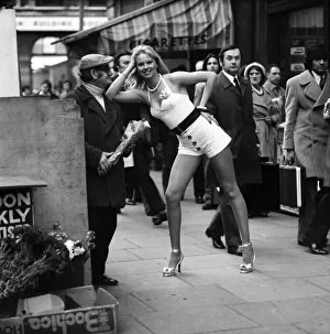 A London flower seller says it with flowers when he met model Christine Donna