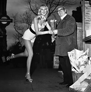 A London flower seller says it with flowers when he met model Christine Donna