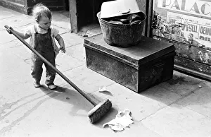 00447 Prints: London Kids, children seen here playing in the street during the spring of 1941 Circa May