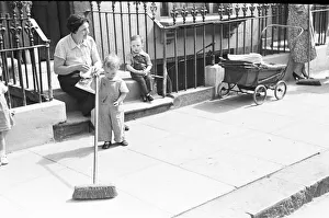 00447 Prints: London Kids, children seen here playing in the street during the spring of 1941 Circa May