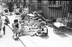 00447 Prints: London Kids, children seen here playing in the street during the spring of 1941 Circa May
