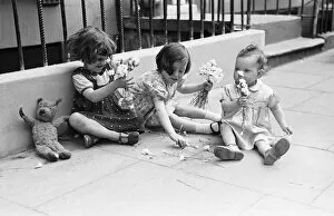 Images Dated 4th November 2016: London Kids, children seen here playing in the street during the spring of 1941 Circa May
