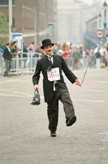 01062 Prints: The London Marathon - 1990 Runners pass through and around the Tower Bridge area