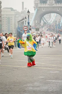 01062 Prints: The London Marathon - 1990 Runners pass through and around the Tower Bridge area