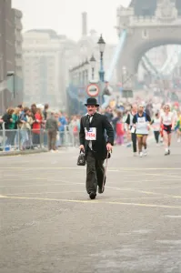 01062 Prints: The London Marathon - 1990 Runners pass through and around the Tower Bridge area