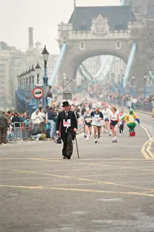 01062 Prints: The London Marathon - 1990 Runners pass through and around the Tower Bridge area