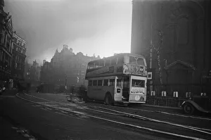 Fire Fighters Prints: A London Transport double decker bus stopped on St Pauls Churchyard l