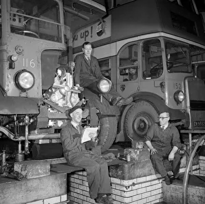 London Transport mechanics seen here checking the engine of a Leyland bus