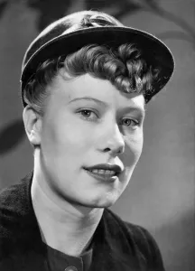 Bus Conductor Prints: A London transport woman bus conductress commonly known as a clippee