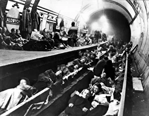 Londoners use Aldwych Underground Station as an air raid shelter during bomb attacks