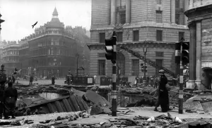01443 Prints: Londons second fire blitz. Huge crater outside the Bank. Circa 1941