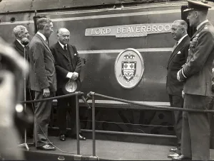 Lord Beaverbrook unveils his nameplate on a Southern Railway train, BR 34054 / SR No