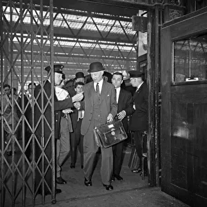 Scandal Prints: Lord Denning, Minister of the Rolls arrives at Waterloo Station to present his report