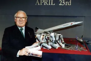 LORD KING WITH A MODEL OF CONCORDE HOLDING AIRLINE TICKETS 08 / 02 / 1995