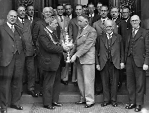 Lord Provost Stewart presenting the Glasgow Charity Football Cup to Tom White of Celtic