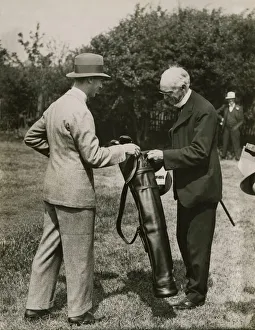 00131 Prints: Lord Riddell presents a bag of golf clubs to the Duke of York made by many famous players