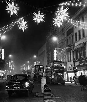Lights Prints: Lord Street, christmas lights stretch away uphill from the junction with Paradise Street