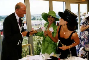 Lord White of Hull Chairman of Hanson Industries with his girlfriend