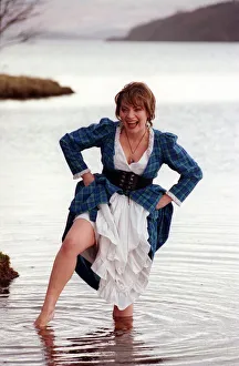 Lorraine Kelly GMTV presenter February 1998 wearing tartan dress wading in Loch