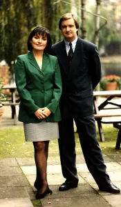 Lorraine Kelly television presenter green jacket grey skirt