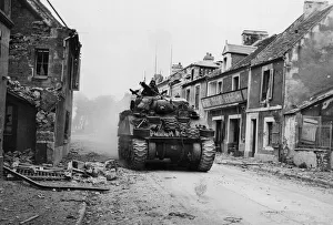 01462 Prints: Lorries, Bren Carriers and despatch riders all fork part of this long convoy of Canadian