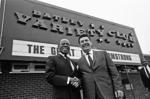 Louis Armstrong seen observing an old Batley tradition. Touching the Yorkshire Mills