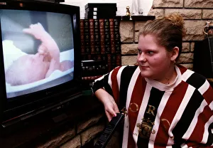 00029 Prints: Louise Brown looking at video of herself as the worlds first test tube baby January