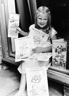 00029 Prints: Louise Brown Test Tube Girl Holding birthday cards on her sixth birthday July1984