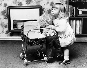 Louise Brown Test Tube Girl playing with doll and dolls pram June 1980