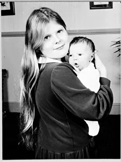 Louise Brown the worlds first test tube baby holds Matthew Shepherd the 1000th such child